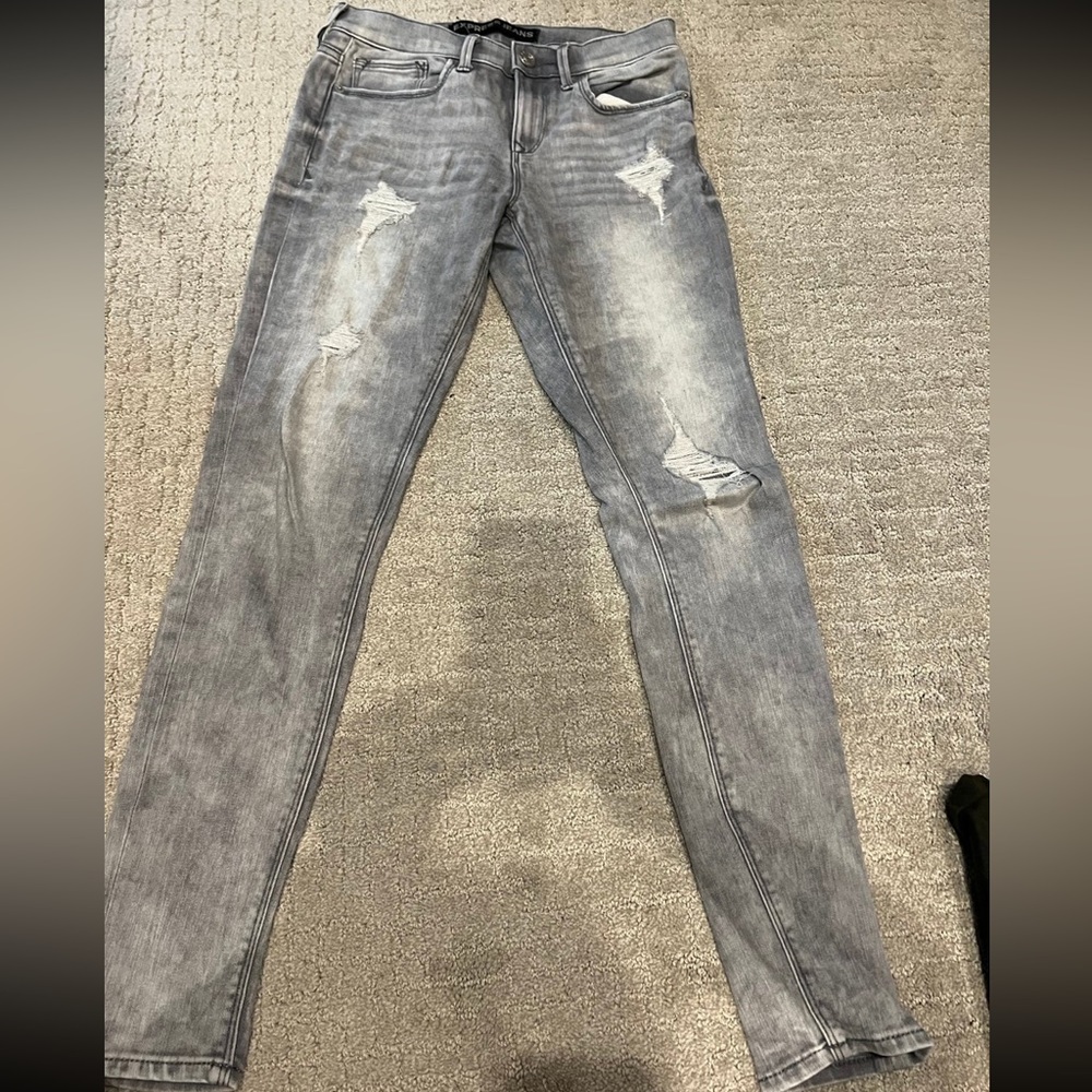 Grey distressed express denim